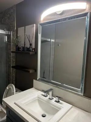 a bathroom with a sink and a mirror at \u6e29\u99a8\u5c0f\u5c4b in Ontario