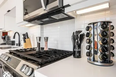 a kitchen counter with a stove top oven at Skyline Haven Near Dodger Stadium with Views in Los Angeles