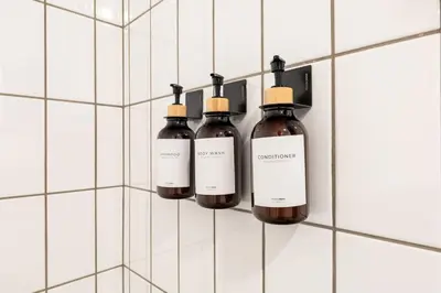four bottles of wine hanging on a wall at Chic and Cozy Home, Walk to Little Tokyo with Parking in Los Angeles