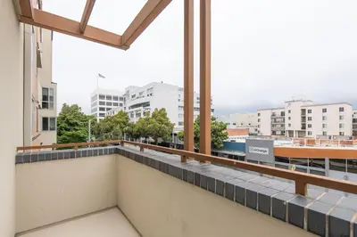 a balcony with a view of the city at Walk to Santa Monica Beach Pier Boardwalk Venice in Los Angeles