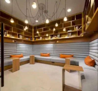 a waiting room with couches and a bench and shelves at Cozy 2bd Apt Near Disneyland Anaheim Conv Center in Anaheim
