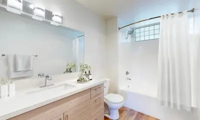 a bathroom with a sink and a toilet and a shower at The Hideaway in MDR, FREE Parking, Heated Pool in Los Angeles