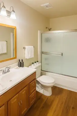 a bathroom with a toilet and a sink and a shower at Ocean Haven Beachfront Getaway by Redondo Pier in Redondo Beach