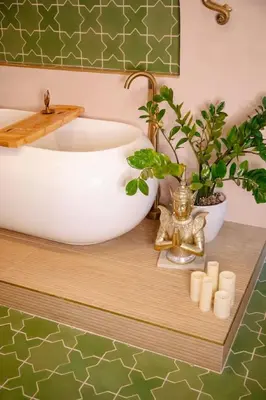 a bathroom with a white bowl sink and plants at Casa Cleopatra Bold Design, Pool and Privacy in Los Angeles
