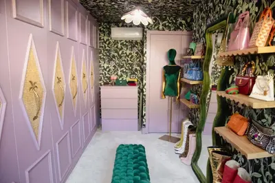 a dressing room with pink and green walls and a door at Casa Cleopatra Bold Design, Pool and Privacy in Los Angeles