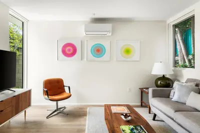 a living room with a couch and a chair at Modern Mar Vista Hideaway New TwoStory ADU in Los Angeles