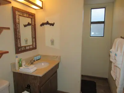 a bathroom with a sink and a mirror at Gold Rush in Big Bear Lake