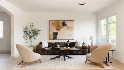 a living room with a couch and a table at Modern and Charming Luxe Home in Los Angeles in Altadena