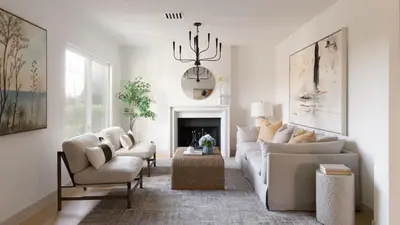 a living room with a couch and two chairs and a chandelier at Modern and Charming Luxe Home in Los Angeles in Altadena