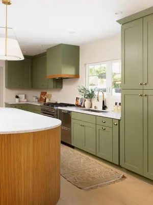 a kitchen with green cabinets and a sink at Modern and Charming Luxe Home in Los Angeles in Altadena