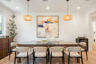 a dining room with a table and chairs at 4mil WestLA Lux Manor Santa Monica and Beverly Hills in Los Angeles