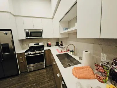 a kitchen with a sink and a stove top oven at Venice Beach Getaway Steps from the Ocean Marina and Boardwalk in Los Angeles