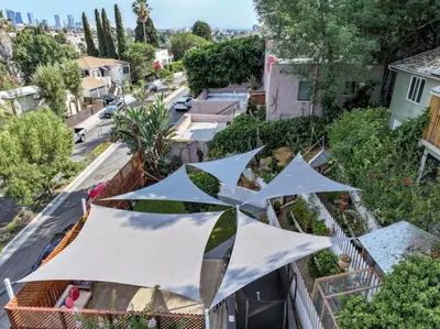 an overhead view of a garden with a white tent at Silver Lake Cozy Getaway in Los Angeles