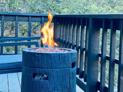 a garbage can with a fire in it at Brentwood Haus in Lake Arrowhead