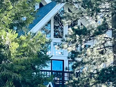 a house with trees in front of it at Brentwood Haus in Lake Arrowhead