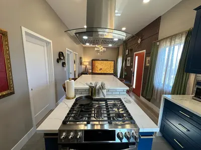 a kitchen with a stove top oven in a kitchen at Stylish Highland Park Home in Los Angeles