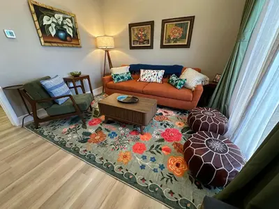 a living room with a couch and a table at Stylish Highland Park Home in Los Angeles