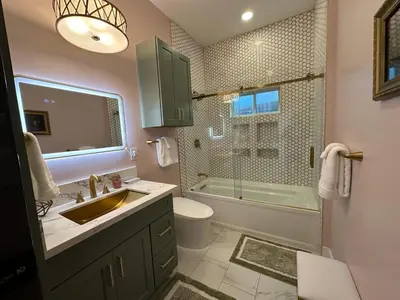 a bathroom with a sink and a shower at Stylish Highland Park Home in Los Angeles