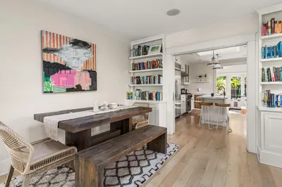 a kitchen and dining room with a table and chairs at Venice 2BR and Guest Studio with Tub & Garden in Los Angeles