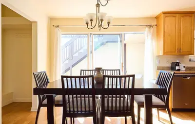a kitchen with a dining room table with chairs at Malibu Nature Escape - 2BR Hideaway Nestled in the Woods, Minutes from the Beach in Malibu
