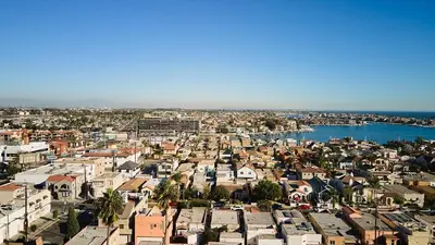 an aerial view of a city with a harbor at Beach Life in Belmont Shore in Long Beach
