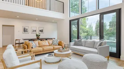 a living room with a couch and chairs at Luxury Retreat 5mins to the Lake Game Room Fire Pit Howlite by AvantStay in Lake Arrowhead
