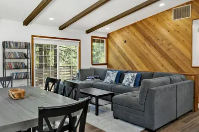 a living room with a couch and a table at The Fox Den #2568 in Big Bear City