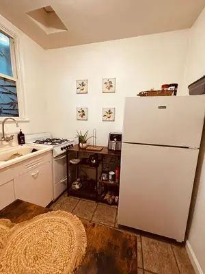 a kitchen with a white refrigerator and a sink at Cozy Studio Studio City Unit 6 in Los Angeles