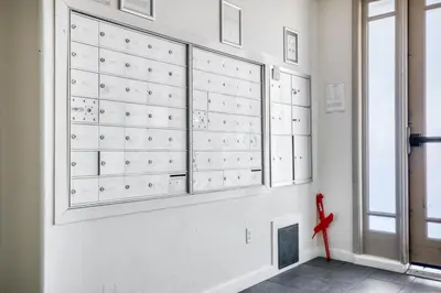 a wall of drawers in a room with a window at Blueground Sawtelle view nr Westwood Park LAX-1396 in Los Angeles