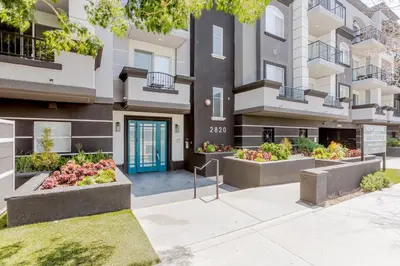 a building with three raised garden beds in front of it at Blueground Sawtelle view nr Westwood Park LAX-1396 in Los Angeles