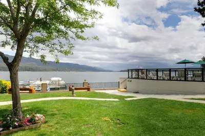 a park with a view of the water and a boat at Getaways at Lagonita Lodge in Big Bear Lake