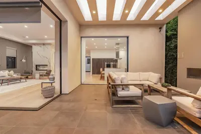a living room with a couch and a table at Laurel K Villa in Los Angeles