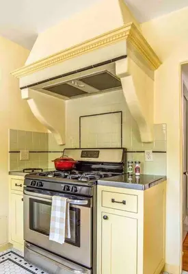 a kitchen with a stove and a hood at Welcome to The Spanish Hideaway! in Los Angeles