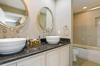a bathroom with a sink and a mirror at City View Rancho Palos Verdes Home in Rancho Palos Verdes