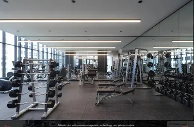 a gym with lots of equipment in a building at Sky High at Beaudry 2 Bed Apt WITH FREE PARKING in Los Angeles