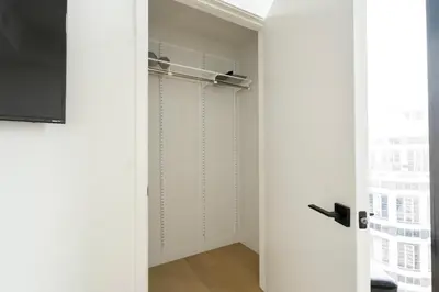 a room with a closet with a sliding door at Sky High at Beaudry 2 Bed Apt WITH FREE PARKING in Los Angeles