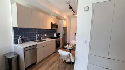 a kitchen with a sink and a counter top at Luxury Walk of Fame Studio in Los Angeles