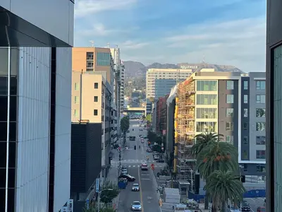 a view of a city street with cars at Modern Cosmopolitan APT Mid Hollywood with Free Parking 10mins to Universal Studios in Los Angeles