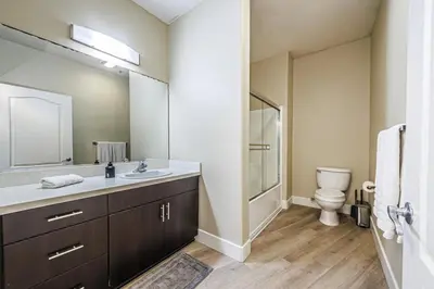 a bathroom with a sink and a toilet at 2BD Marina Condo Near Venice Beach, Pool & Free Parking in Los Angeles