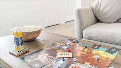 a table with a lego game on a table at Beach Retreat with Oceanfront Balconies Direct Beach Access Pacific Coast Outlook by AvantStay in Malibu Beach