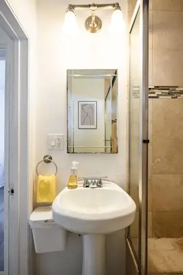 a bathroom with a sink and a mirror at Near LA Cozy Home with Full Kitchen & Laundry in San Gabriel