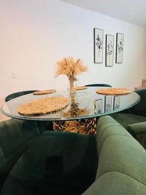 a glass table with three pies on it at The Hollywood loft FREE Parking in Los Angeles