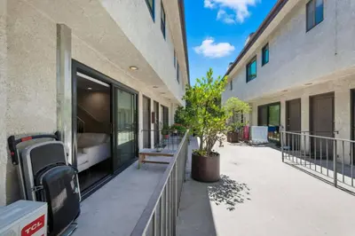 a building with a bench in front of a building at Burbank Bliss Retreat in Los Angeles