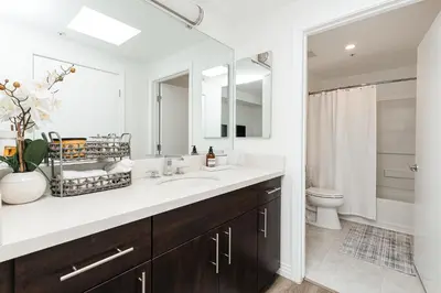 a bathroom with a sink and a toilet at Cozy 2BD apartment in Los Angeles