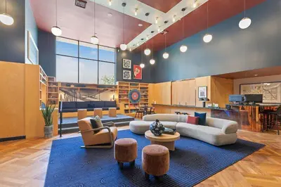 a large living room with couches and chairs at Beautiful Apartment in Hollywood in Los Angeles
