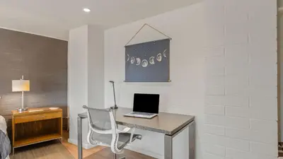 a room with a desk with a laptop on it at Malibu Hills Studio w Mountain Views Near beaches Cielo Nook by AvantStay in Malibu Beach