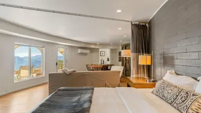 a bedroom with a bed and a living room at Malibu Hills Studio w Mountain Views Near beaches Cielo Nook by AvantStay in Malibu Beach