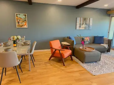 a living room with a couch and a table at Echo Lake view condo - newly renovated - centrally located in Los Angeles