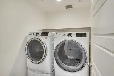 a washing machine and a dryer in a room at 2 Mi to Cabrillo Beach Luxe LA Gem with Balcony in San Pedro
