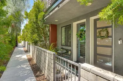 a porch of a house with a fence at 2 Mi to Cabrillo Beach Luxe LA Gem with Balcony in San Pedro